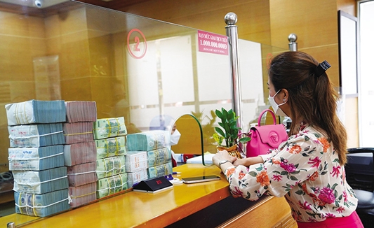 Vốn đắt, tiền khan, doanh nghiệp xoay xở ra sao?